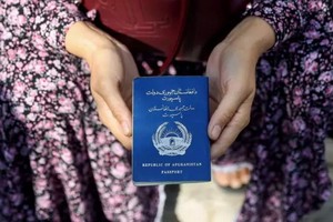 阿富汗護照。（圖：Getty Images）