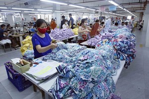 興隆成衣有限責任公司生產線。（圖：越通社）