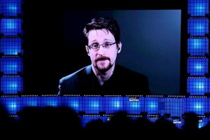 斯諾登發表視頻講話。（圖：AFP）