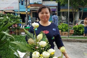 第十一郡第七坊的华人女干部蔡丽芳。