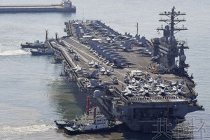 3月28日，美国海军核动力航母“尼米兹”号停靠韩国南部釜山。（图：共同社）