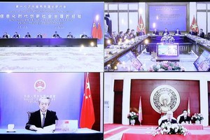 第十七次越中两党理论研讨会通过视频方式举行。（图：越通社）