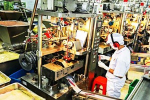 5月份整个工业生产指数环比增1.5%和同比增5.5%。（图：黄雄）