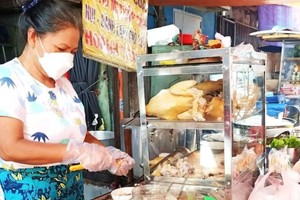 第五郡冯兴街市饮食摊。