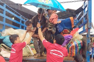 志愿战士2018年协助老挝阿速坡省沙纳塞县桑片-桑南内水电站大坝溃决事故的受灾民众。