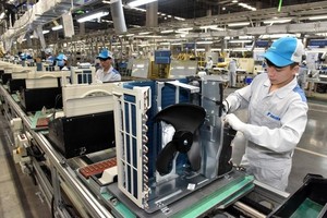 越南促进高新技术领域发展。（图：邓明）