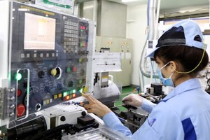 位于河内市糜冷县光明工业区的越南INOAC有限责任公司（日本FDI企业）生产活动一隅。