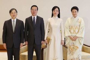 日本天皇德仁和皇后与越南国家主席武文赏和夫人合影。（图：越通社）