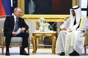 阿联酋总统谢赫穆罕默德·本·扎耶德与俄罗斯总统普京在阿布扎比举行会晤。（图：路透社）