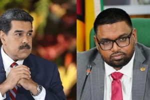 委内瑞拉领导人马杜罗和圭亚那领导人伊尔凡·阿里。（图：社交媒体）