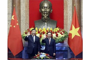 越南党政领导会见中共中央总书记、中国国家主席习近平