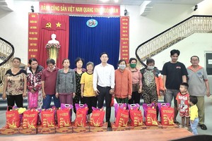 本报与登越公司助穷人过好新年