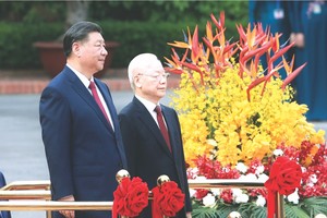 党中央总书记阮富仲为中共中央总书记、国家主席习近平举行最高规格的欢迎仪式。