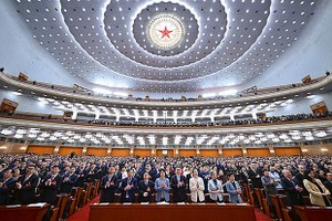 3月10日，中国人民政治协商会议第十四届全国委员会第二次会议在北京人民大会堂举行闭幕会。（图：新华社）