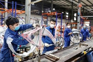 统一自行车公司生产自行车以内销及出口。（图：陈越）