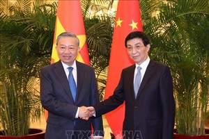 党中央总书记、国家主席苏林会见中国政协主席王沪宁