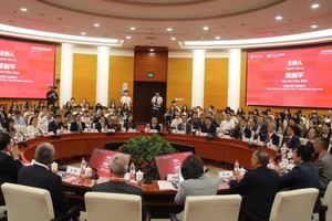越中新闻与传媒高等教育对话论坛场景。（图：越通社）