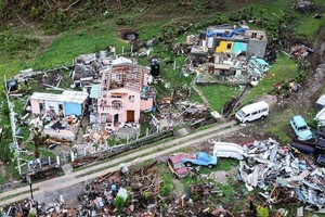 图为圣文森特和格林纳丁斯联合岛被摧毁房屋。（图：国际移民组织）