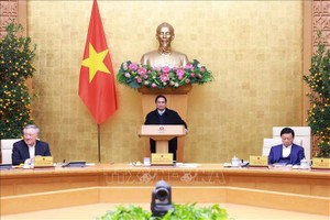 政府总理范明政主持会议。（图：越通社）