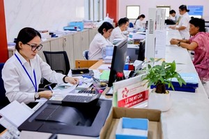 本市机构调整，精简逾7000余人。（示意图：越通社）