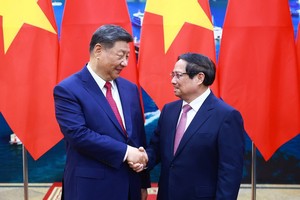 政府总理范明政会见中共中央总书记、中国国家主席习近平