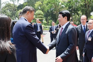 国家主席梁强欢迎中共中央总书记、中国国家主席习近平。（图：越通社）