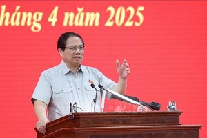 政府总理范明政。