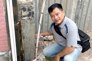 堤岸历史地界石碑正逐渐消失 