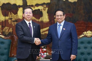 范明政总理接见中国华电科工集团有限责任公司董事长彭刚平。（图：越通社）