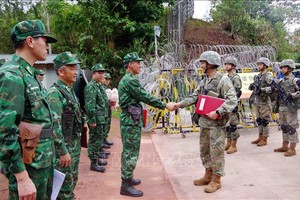 越中双方巡逻组在阿巴寨-龙富通道分界线会合。（图：越通社）