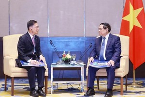 范明政总理会见金务大置地集团（Gamuda Land）的董事长拿督周志华。（图：越通社）