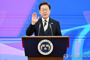 6月4日，在首尔汝矣岛的国会，韩国总统李在明在第21届总统就职宣誓仪式上 宣誓就职。（图：韩联社）