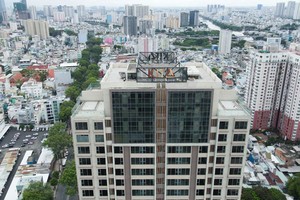 座落陈兴道街927号Kiều by KITA大楼在数百年历史街道更为突出