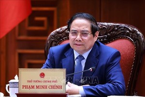 政府总理范明政主持与CT集团领导舉行的工作会议。图自越通社