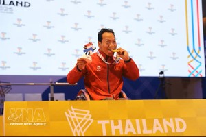 越南举重运动员黎文功。