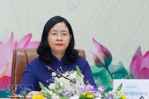 党中央政治局委员、党中央书记处书记、越南祖国阵线中央委员会主席裴氏明怀。