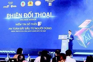 以“在人工智能（AI）时代构建金融数字信任”为主题的2026金融数字信任论坛现场。图自nhandan.vn
