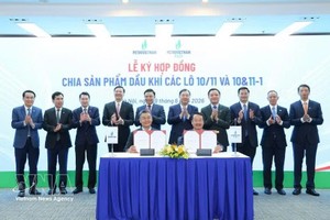越南国家石油集团与越南石油勘探开采总公司签署10/11和10&11-1区块产品分成合同。