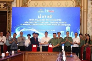 合作备忘录签署仪式现场。图自tphcm.chinhphu.vn