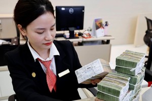 民众在银行的存款额创历史新高。图：绒阮