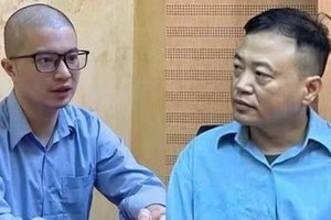 傅德南与阮和平。图自congan.com.vn