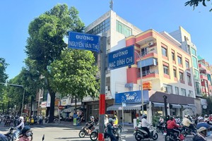 胡志明市正在梳理行政单位调整后重名、重编号的各条街道。