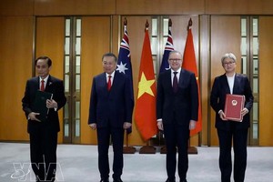 越南党中央总书记、国家主席苏林出席越澳两国合作文件交换仪式。图自越通社