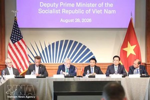越南政府副总理阮文胜出席美国企业座谈会。图自越通社