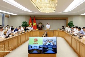 越南政府副总理阮文胜主持召开在越国际金融中心执行委员会第三次会议。投资越通社