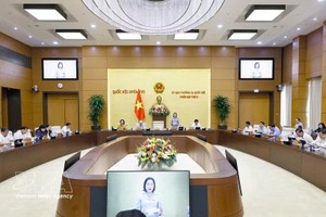 会议现场。图自越通社