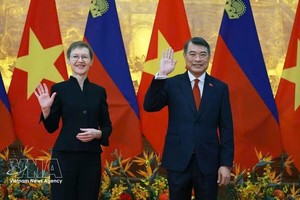 越南政府总理黎明兴和列支敦士登公国首相布丽吉特·哈斯。图自越通社