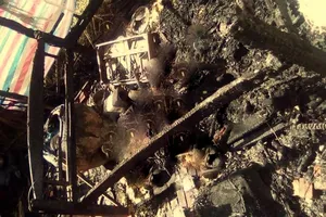 Tạm giữ hình sự người phụ nữ lấy xăng đốt chết chồng