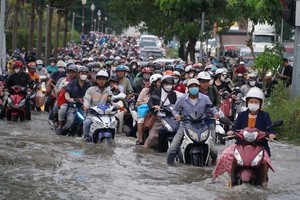 胡志明市这23条道路，只要潮位超过一级警戒线就会被淹。图：范友