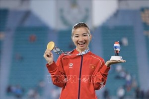 田径运动员阮氏莺夺得本届东运会第三枚金牌。图：越通社